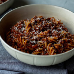 Superbly rich and flavourful, you won't mind that this Bolognese doesn't contain any meat. Plus, when it’s paired with al dente gluten-free pasta and emulsified to make a deliciously rich sauce, you’ll look forward to eating this vegetarian meal prep every time.